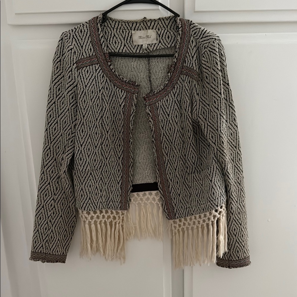 Chic Black and Cream Sweater with Fringe